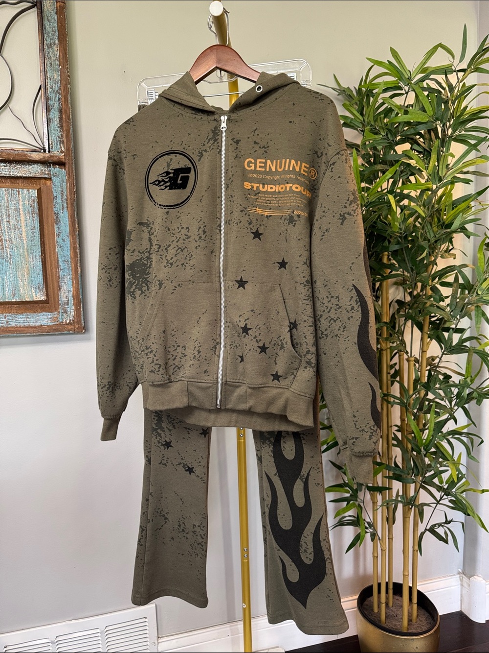 Genuine Studio Olive Graphic Zip Hoodie with Gold and black velour print